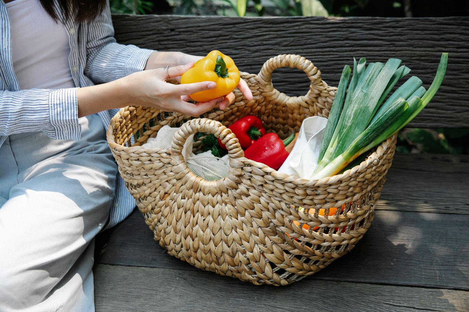 A basket of colorful fresh garden vegetables